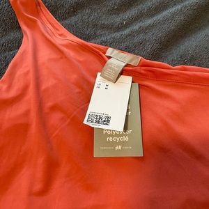 Coral asymmetrical bodycon dress. H & M. New with tags.
